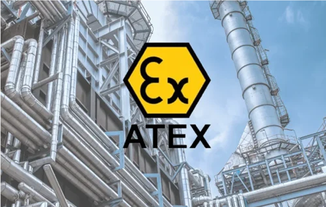 An ex atex logo is displayed in front of a factory