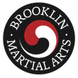 Brooklyn Martial Arts circular logo with red, white, and black yin-yang symbol