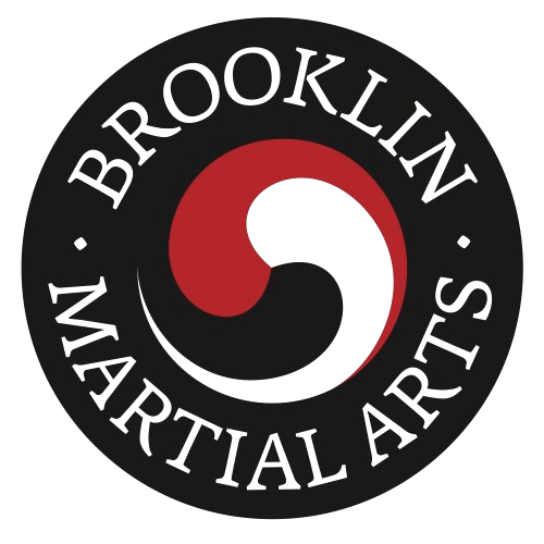 Brooklyn Martial Arts circular logo with red, white, and black yin-yang symbol