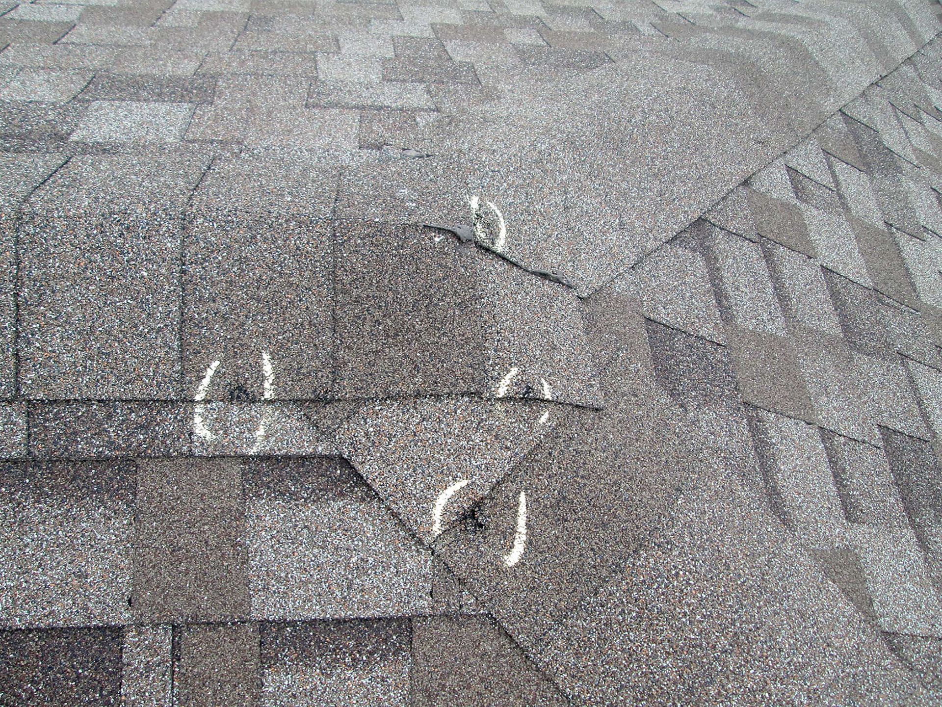 a close up of a roof with a hole in it