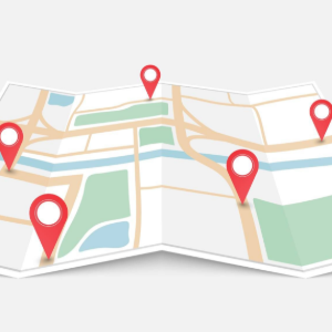 Folded city map with red location pins marking several destinations
