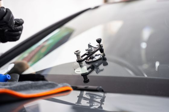 Windshield repair bridge.
