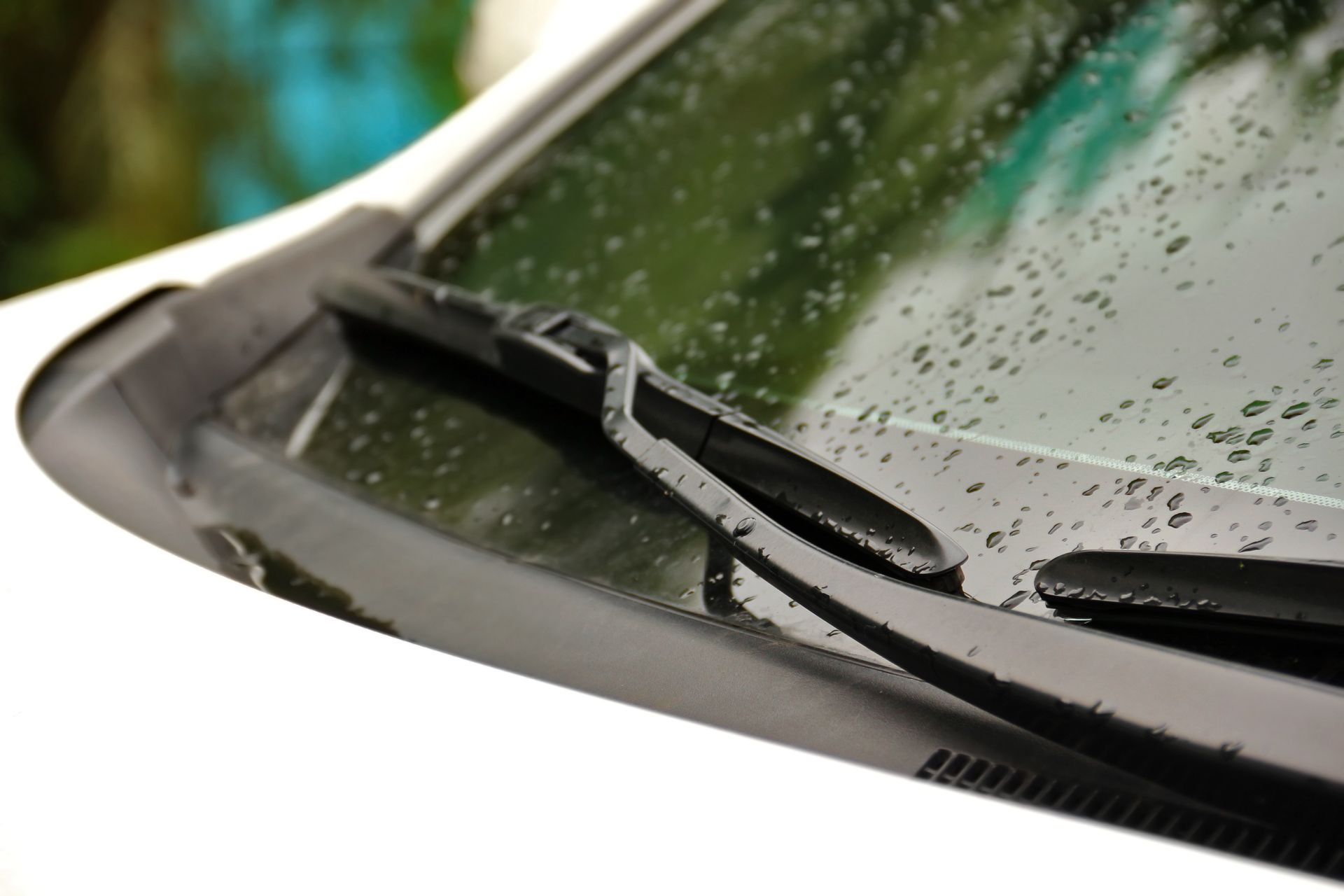 Rainy car windshield wiper.
