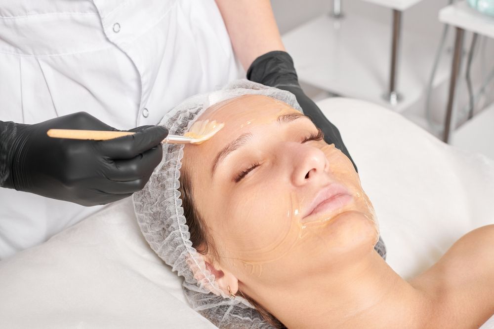 Person Receiving Chemical Peel With Closed Eyes — Embrace Cosmetic Clinic in Bundaberg North, QLD