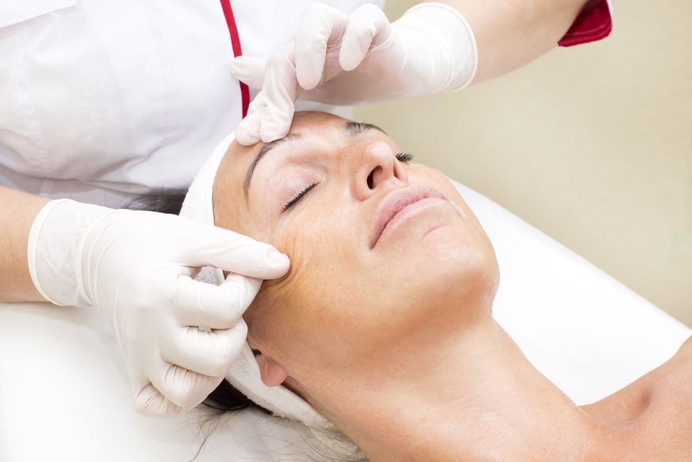 Woman in Facial Treatment — Embrace Cosmetic Clinic in Bundaberg North, QLD