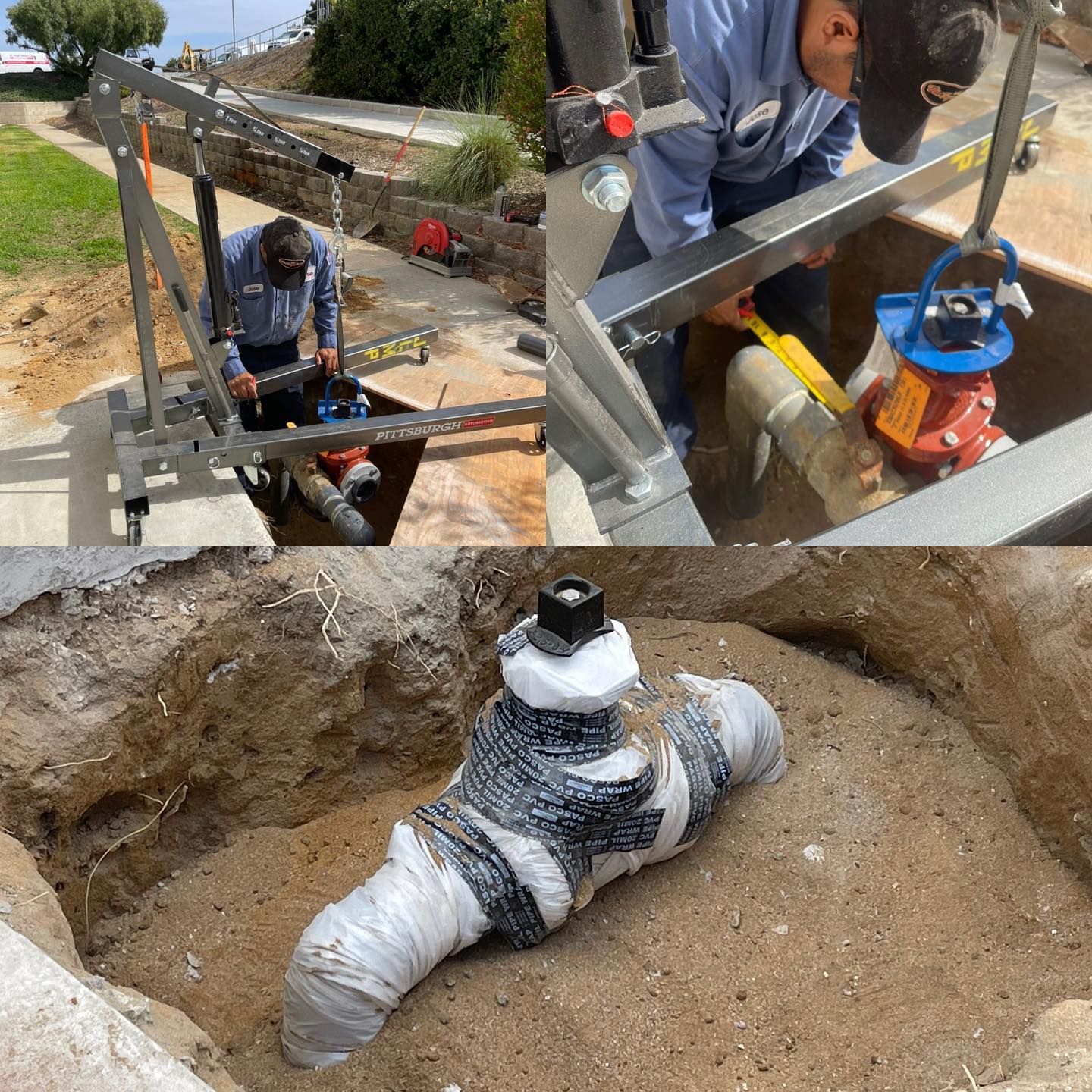 Utility crew repairing underground pipe in a trench with heavy equipment and exposed piping.