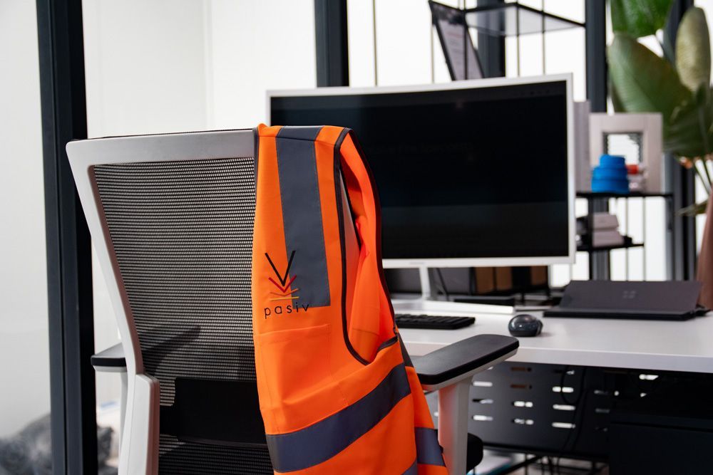 Orange Vest In The Office — Fire Safety Inspection in Illawarra, NSW