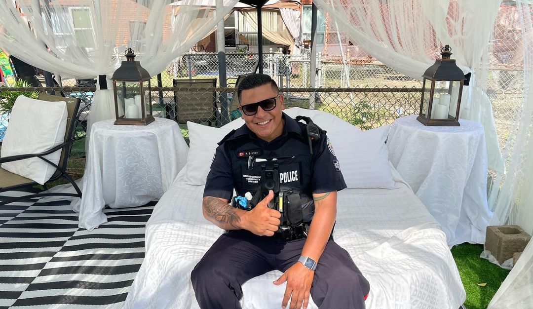 Officer sitting in the lounge smiling