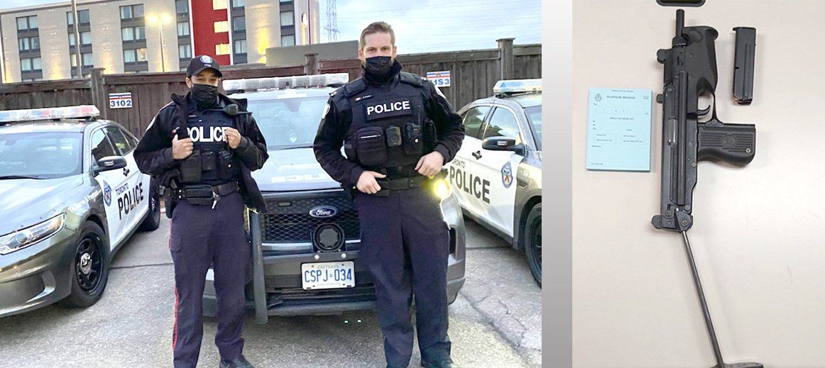Constables Nathan Duke and Christopher Frazer with the firearm they seized
