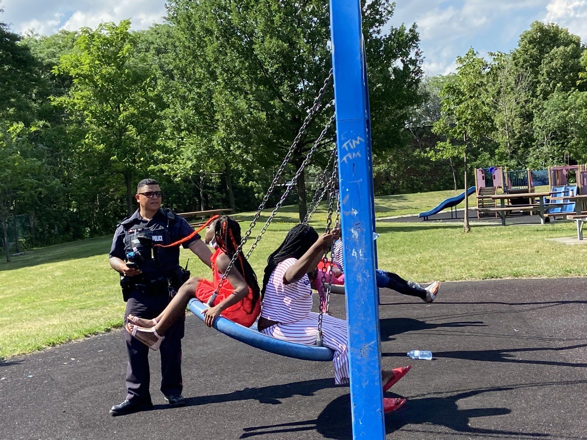 Officers playing with children in the park
