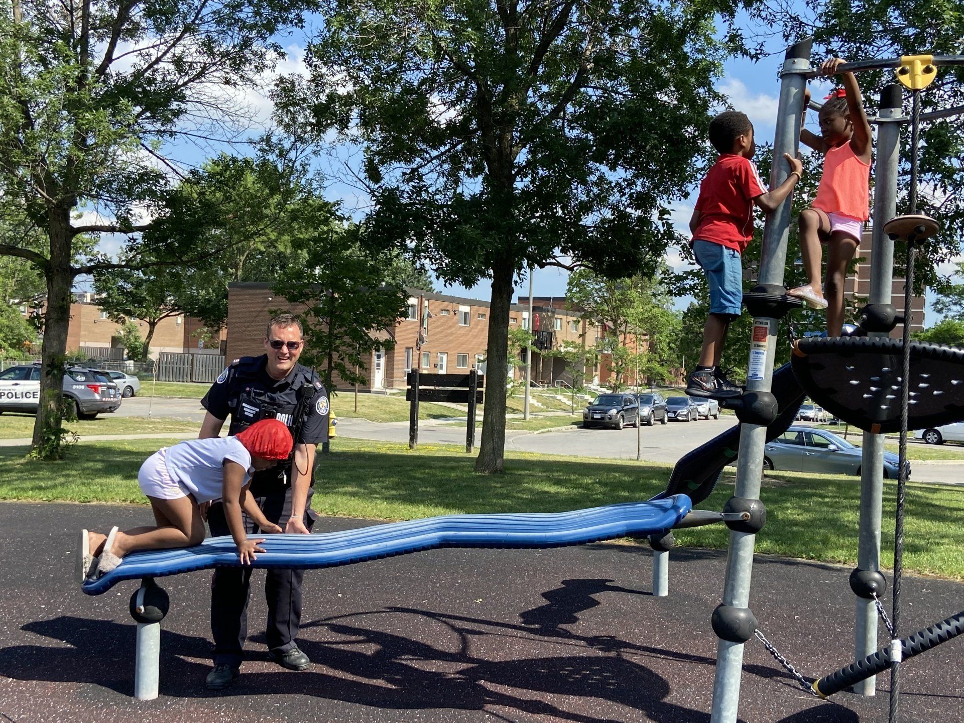 Officers playing with children in the park