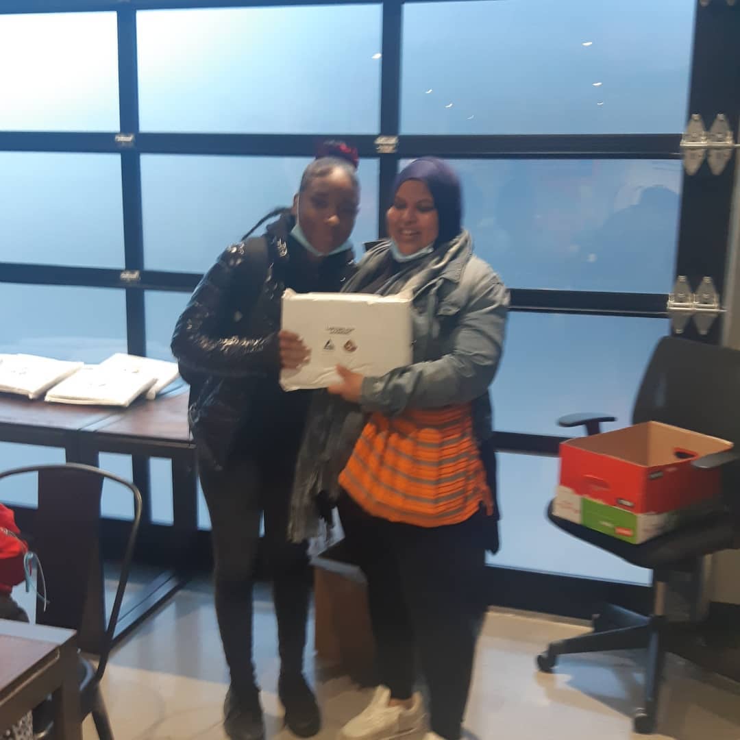 Youth receiving laptops