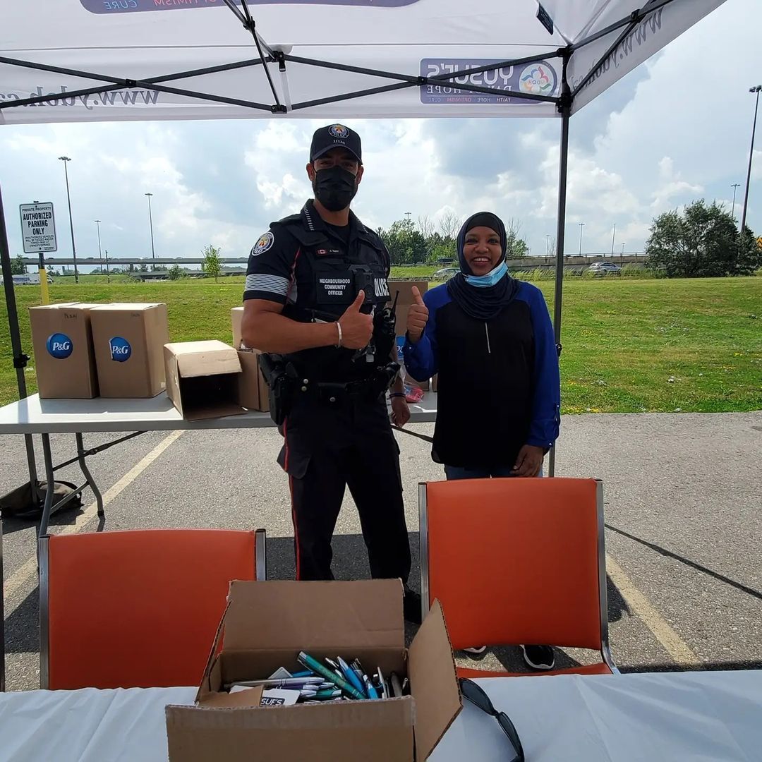 Officer with a volunteer