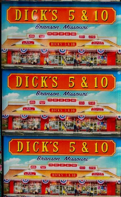 Three stacked identical signs for Dick's 5 & 10 in Branson, Missouri, featuring an illustrated storefront.