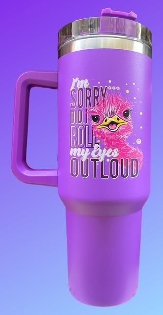A purple tumbler with a handle, an illustration of a pink ostrich and the text: 