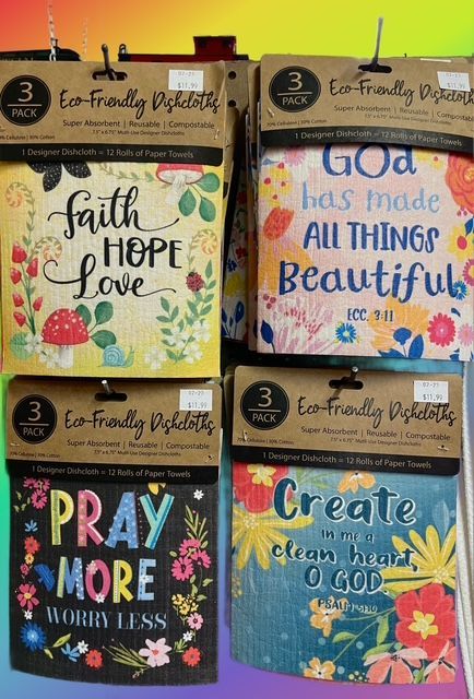 Four packages of eco-friendly dishcloths with floral designs and inspirational religious quotes arranged in a grid.