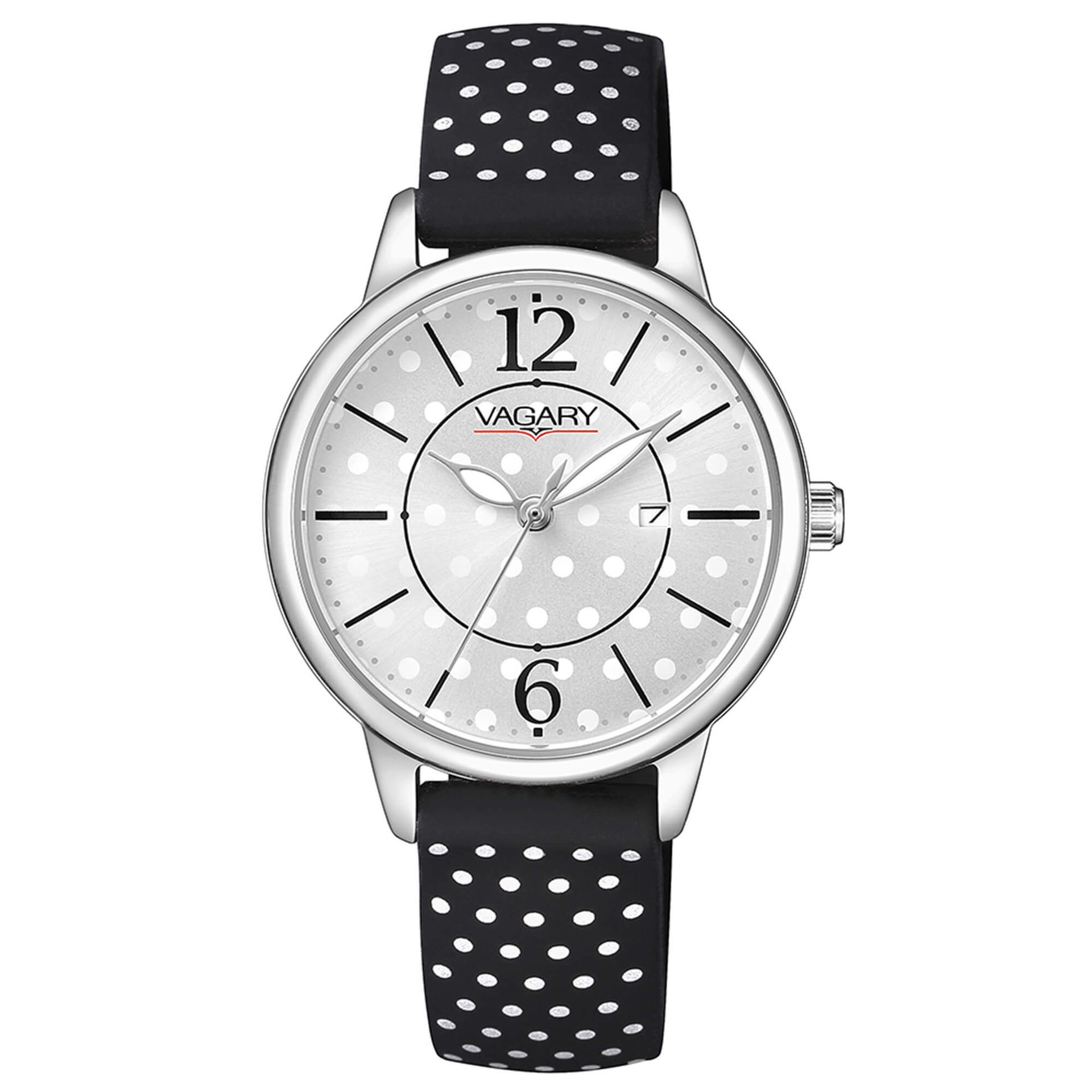 Un orologio bianco e nero con pois sul quadrante