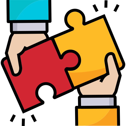 A person is holding two puzzle pieces in their hands.