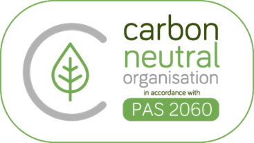 A logo for a carbon neutral organization with a leaf on it