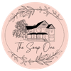Pink circular logo: sketched house, tree, floral border, "The Soap One" text.