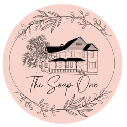 Pink circular logo: sketched house, tree, floral border, "The Soap One" text.