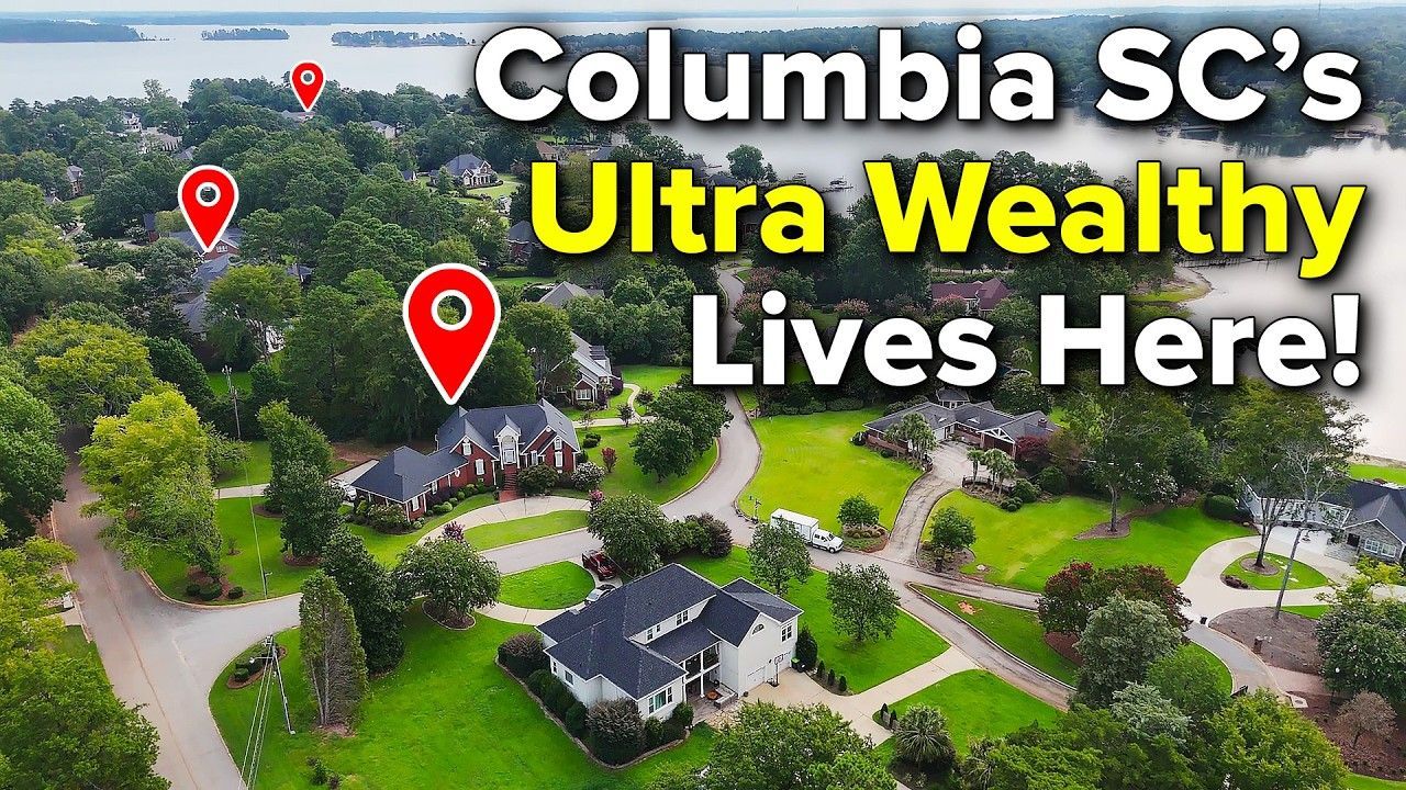 Aerial view of affluent neighborhood in Columbia, SC, with large homes, green lawns, and red location pins.