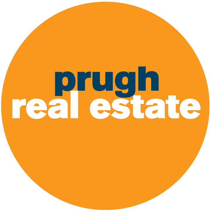 A circular logo with a bright orange background featuring the words 