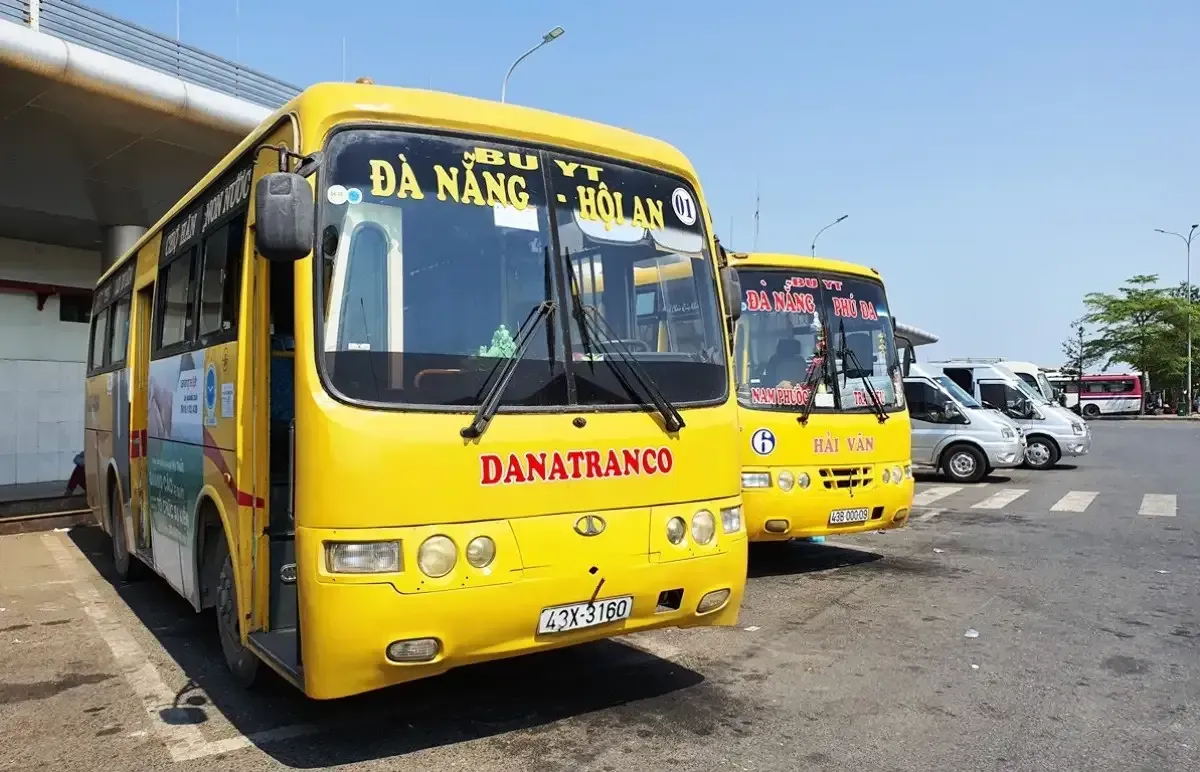 Local bus #1 between Hoi An and Da Nang with locals boarding