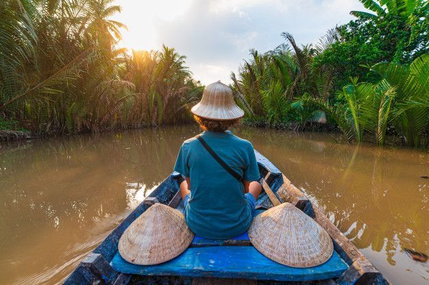 Travel by Small Boat Through Ben Tre