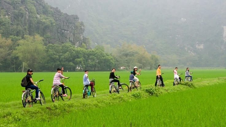 Explore Tam Coc by Boat or Bicycle