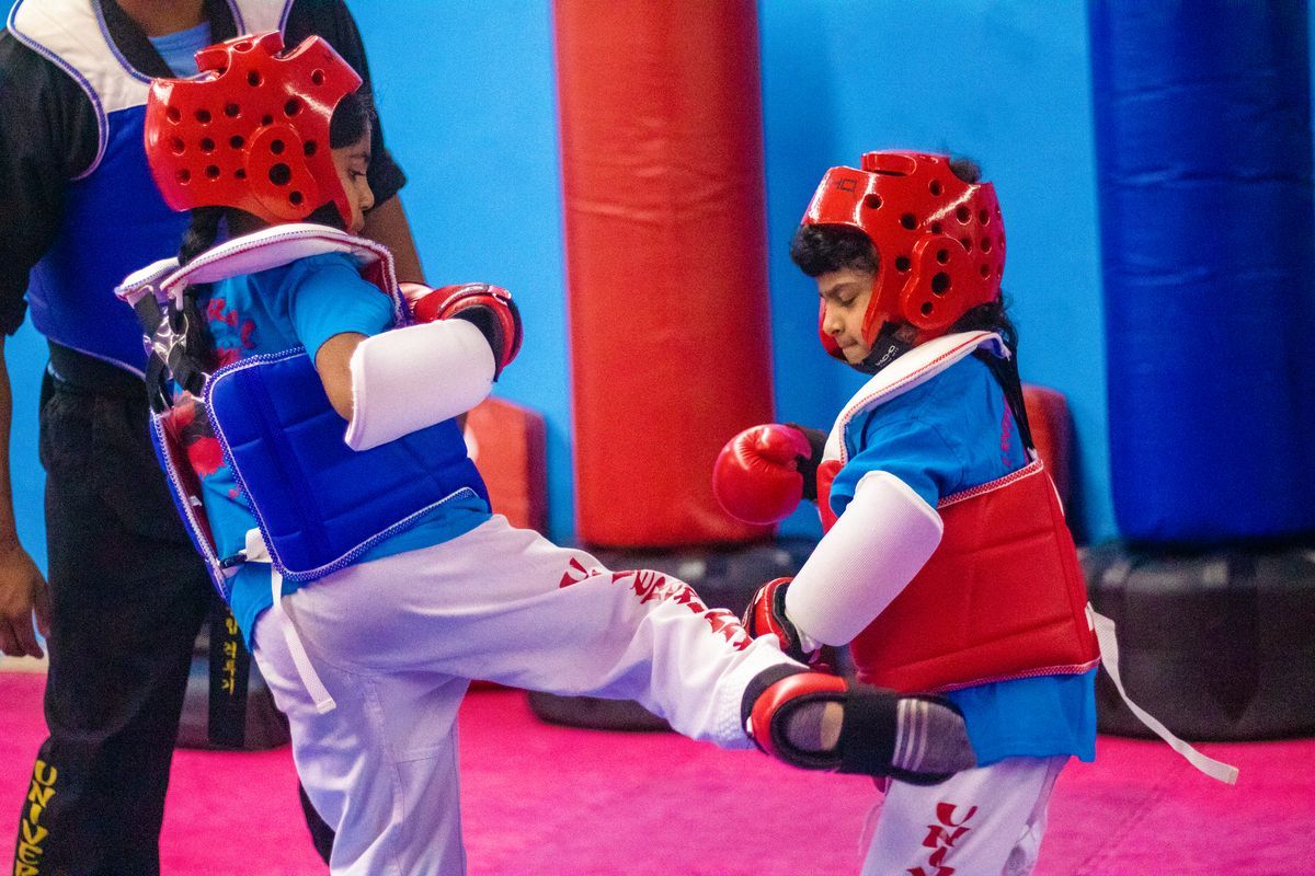 Students practice practical self-defense drills at Universal Mixed Martial Arts.