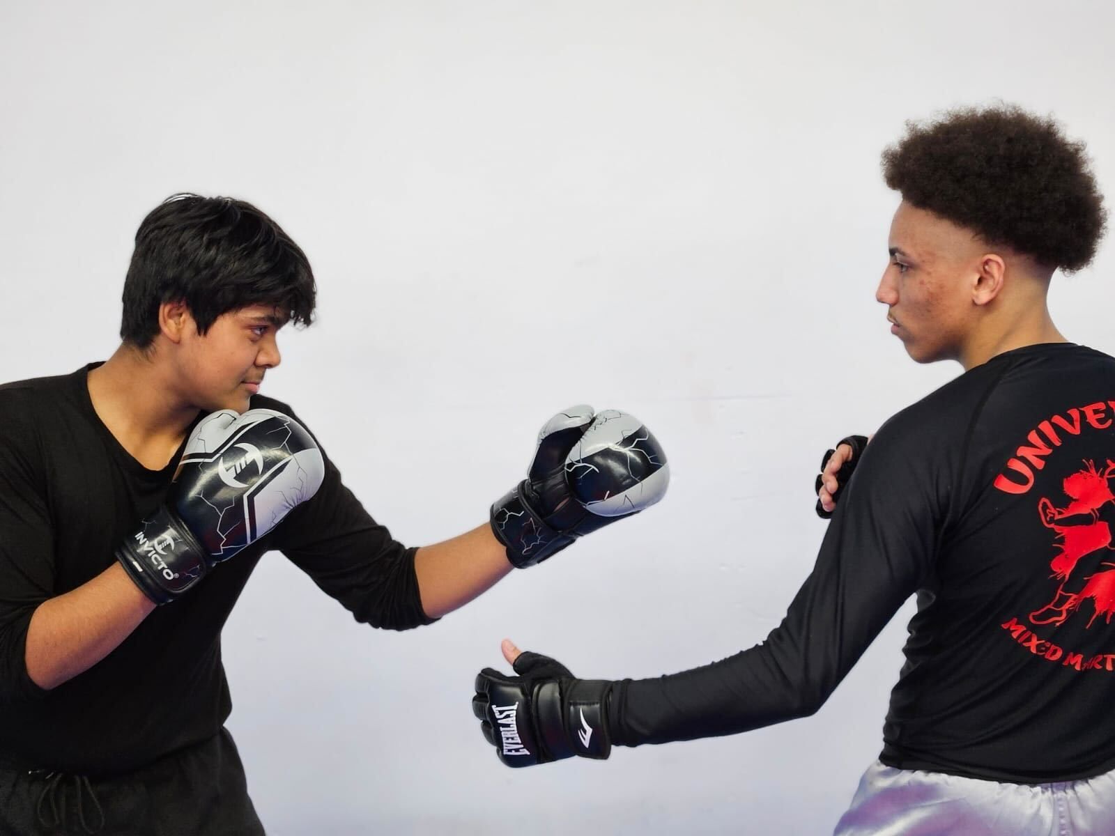 Students training mobility-focused Mixed Martial Arts at Universal Mixed Martial Arts in South Richmond Hill, NY for smoother movement.
