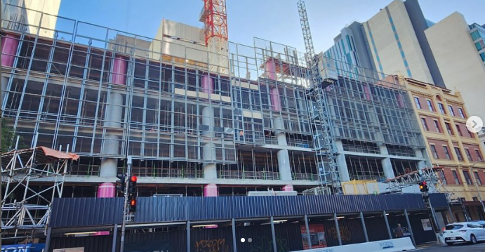 A large building is being built in a city.