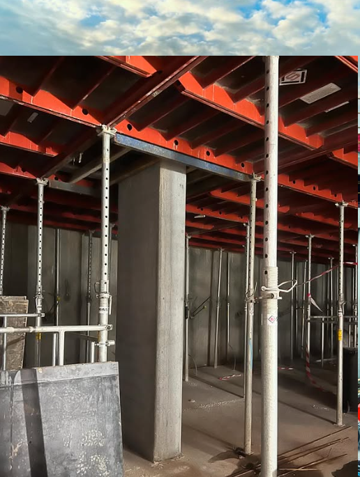 A picture of a building under construction with scaffolding
