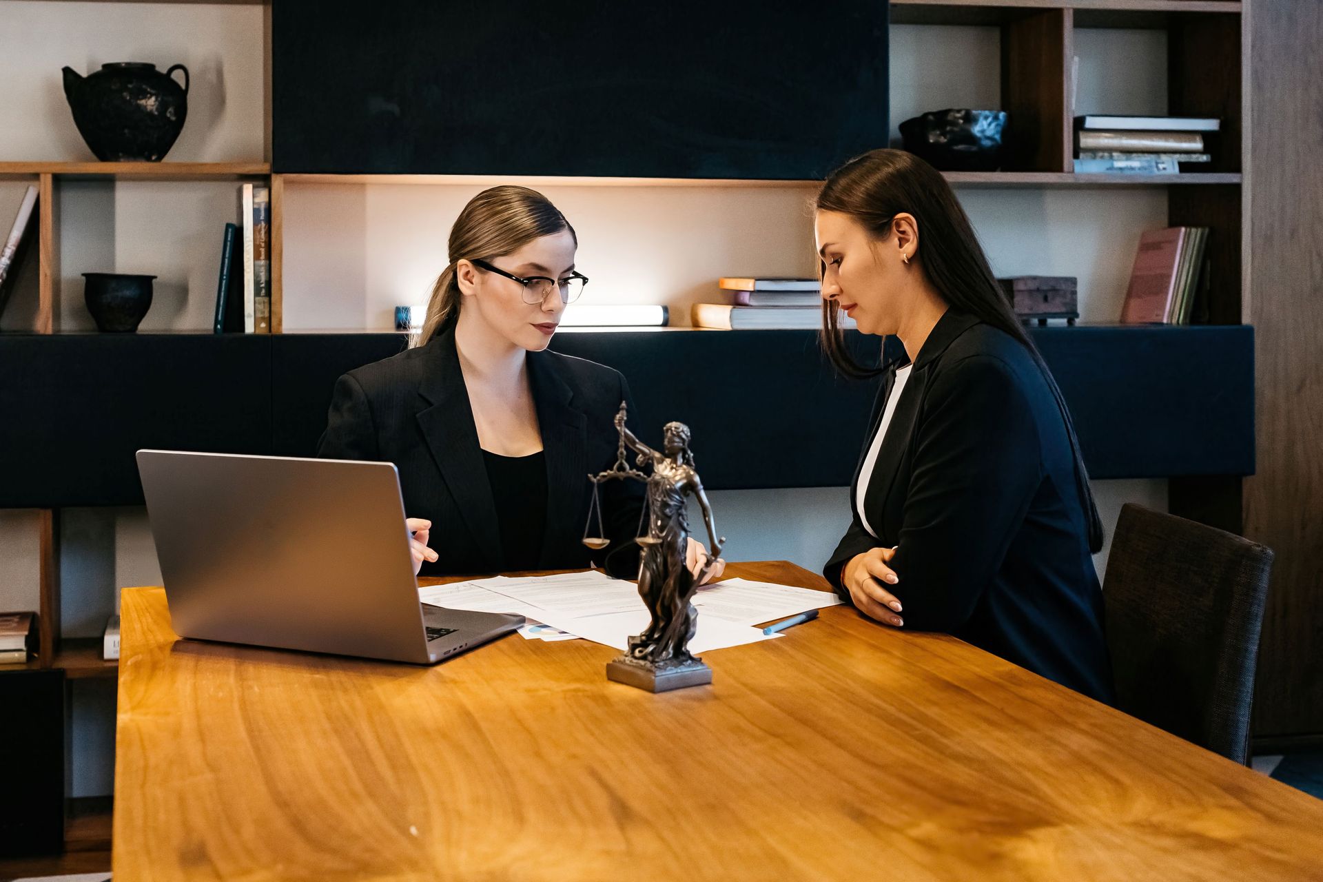 Two Women in a Law Office, Reviewing Documents — Trapski Family Law Geelong in Newtown, VIC