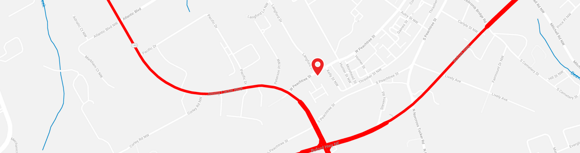 A map of a city with a red line going through it. | The Shop Norcross