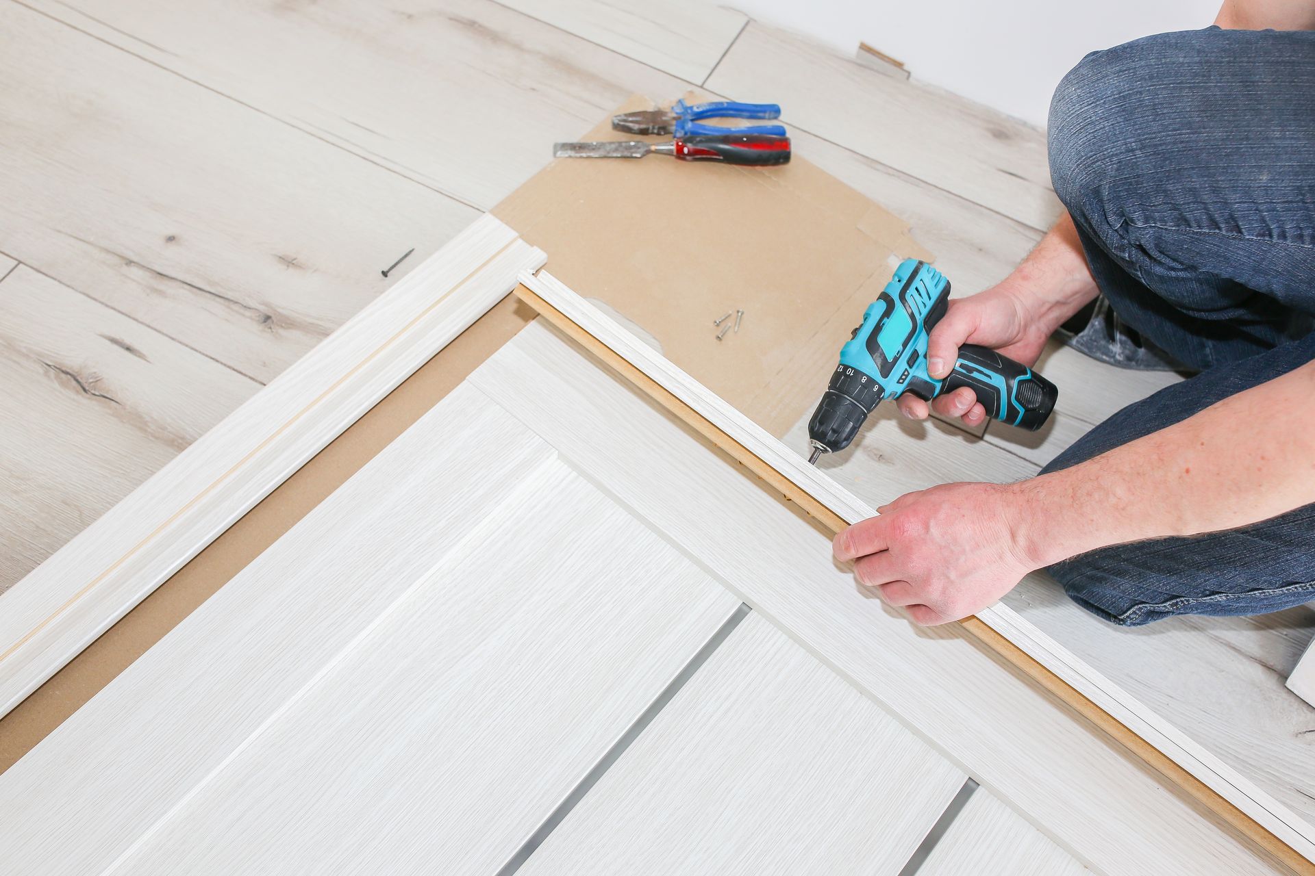 Man is installing the doors