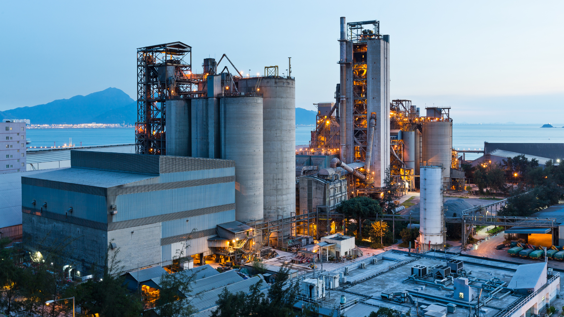 An aerial view of a large industrial plant at night.