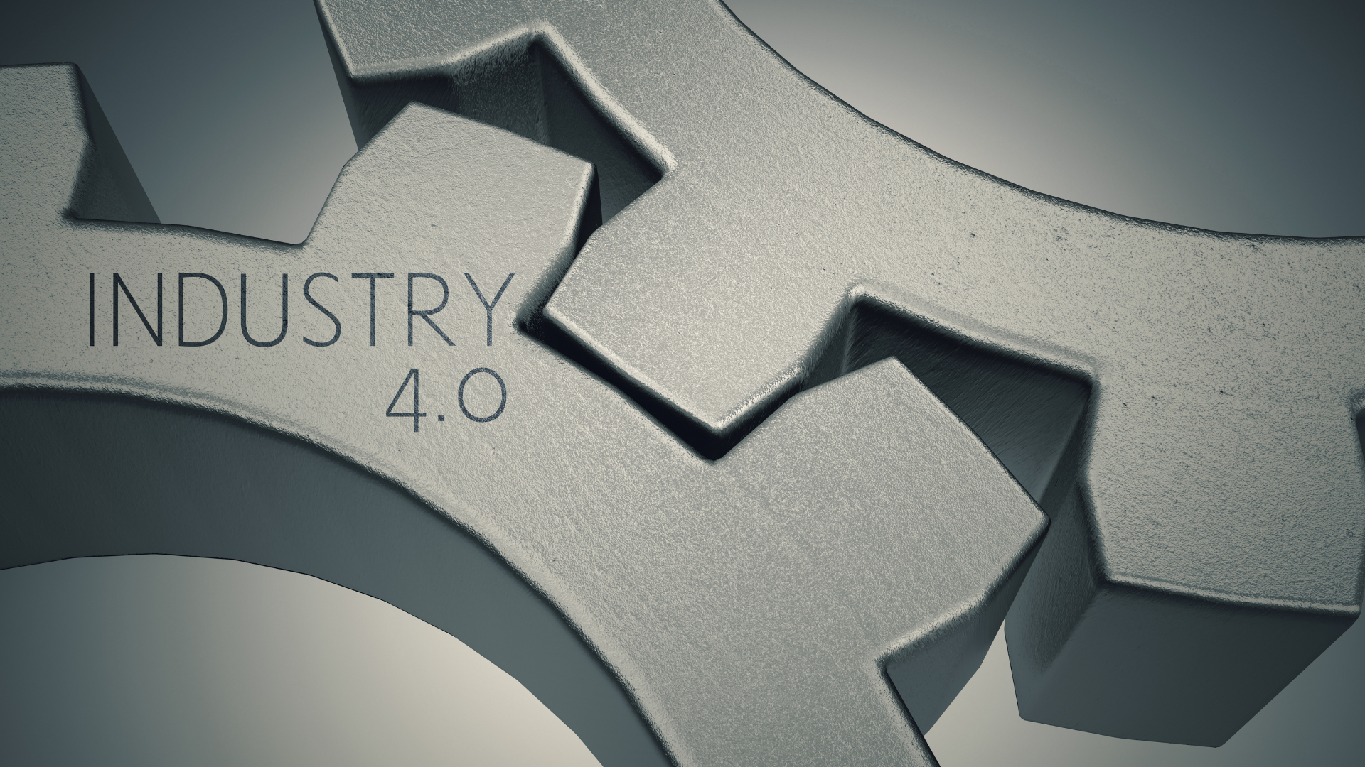 A metal gear with the words industry 4.0 on it