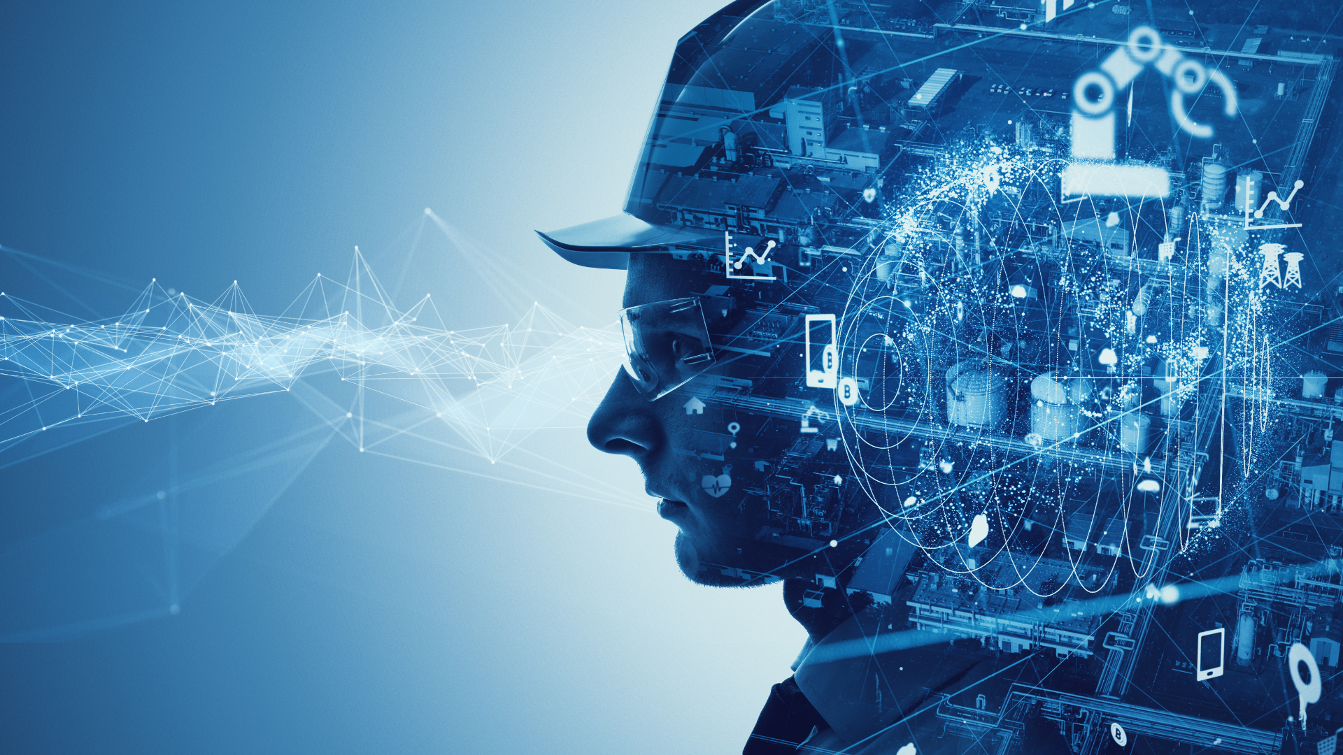 It is a double exposure of a man wearing a hard hat.