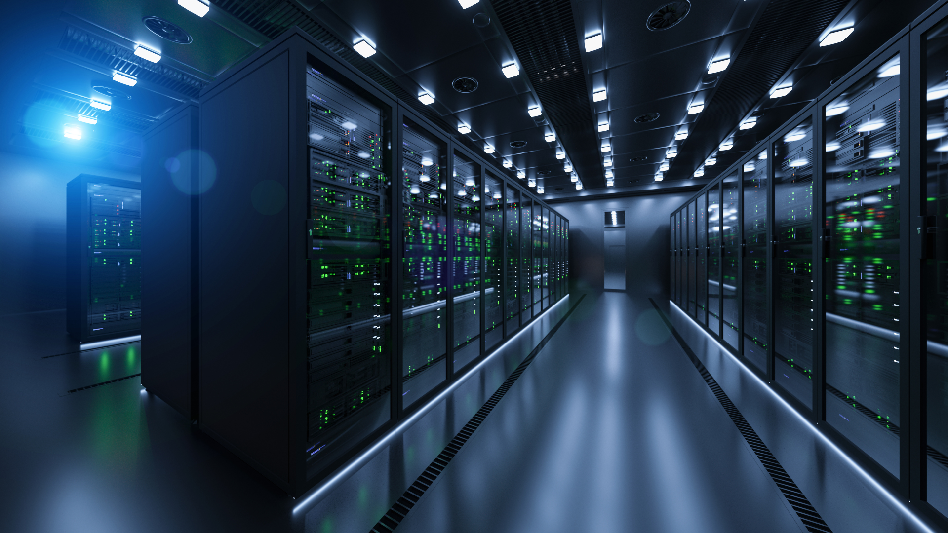 A long hallway in a data center filled with servers.