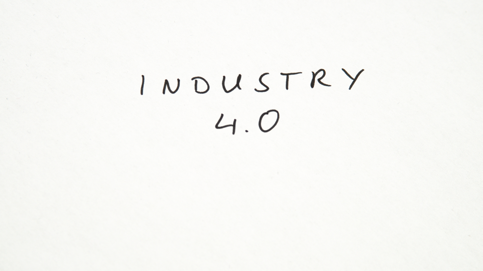 A white piece of paper with the words industry 4.0 written on it