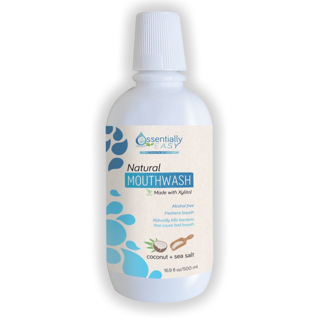 A bottle of natural mouthwash on a white background