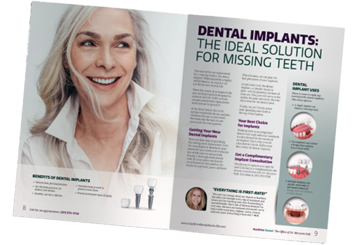 A magazine is open to a page about dental implants