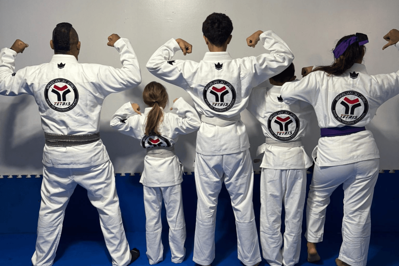 Kids practicing takedown balance drills at Tetris Jiu-Jitsu in Orlando, FL, building confidence.