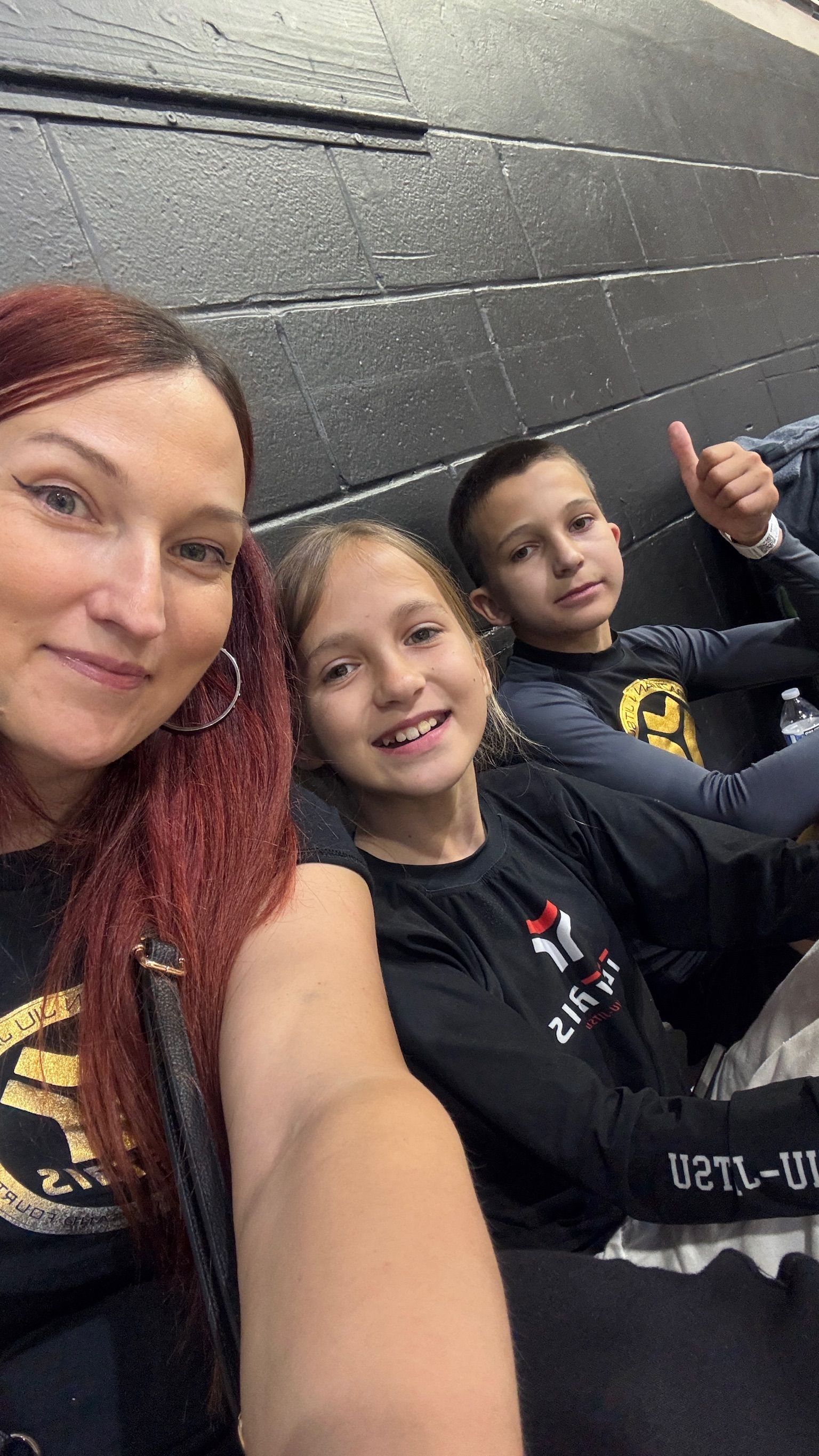 Adults and kids practicing Brazilian Jiu-Jitsu at Tetris Jiu-Jitsu in Orlando, FL.