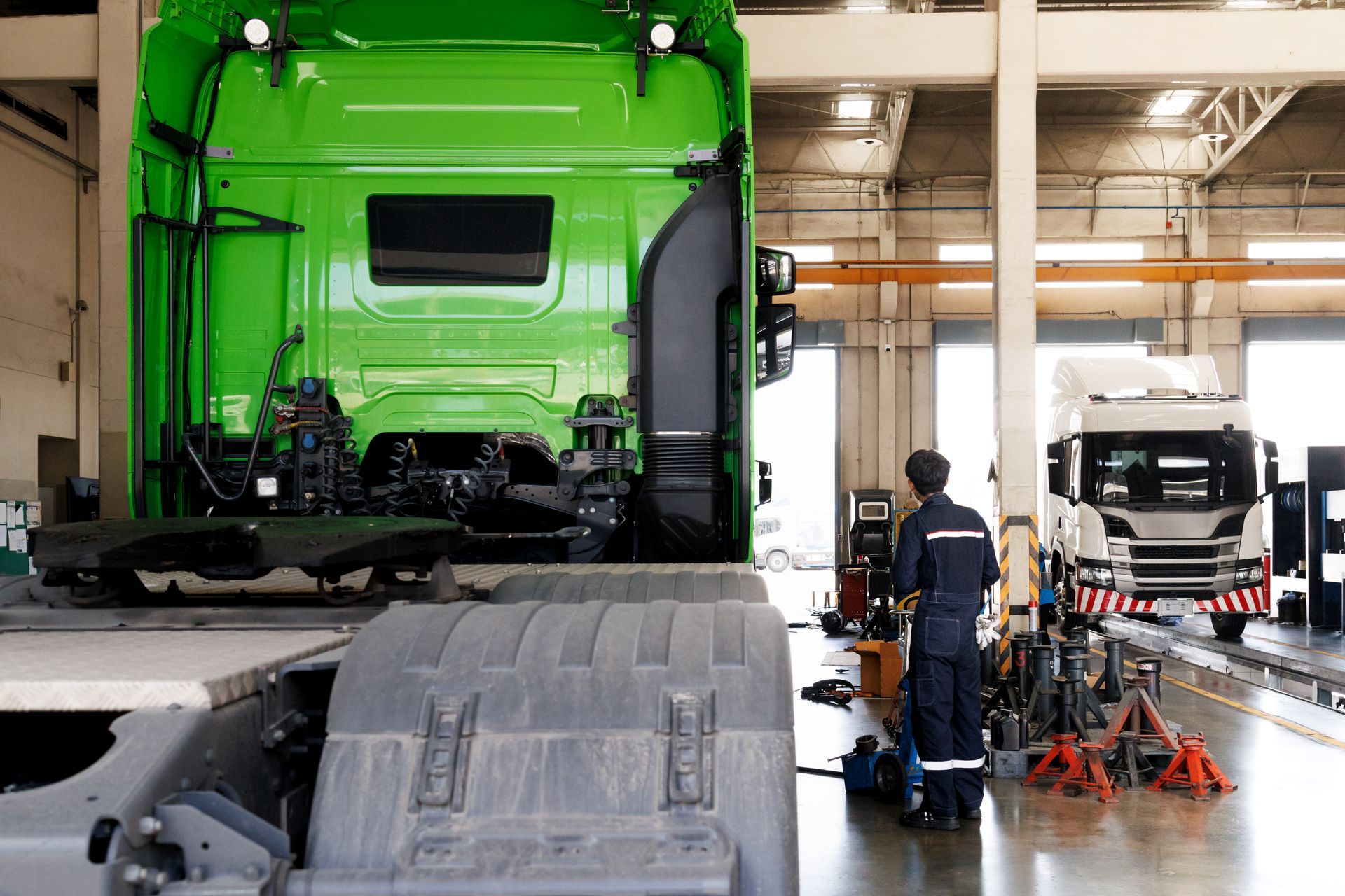 Heavy-duty truck trailer repair in the service bay. Heavy-duty truck trailer repair in the service bay.