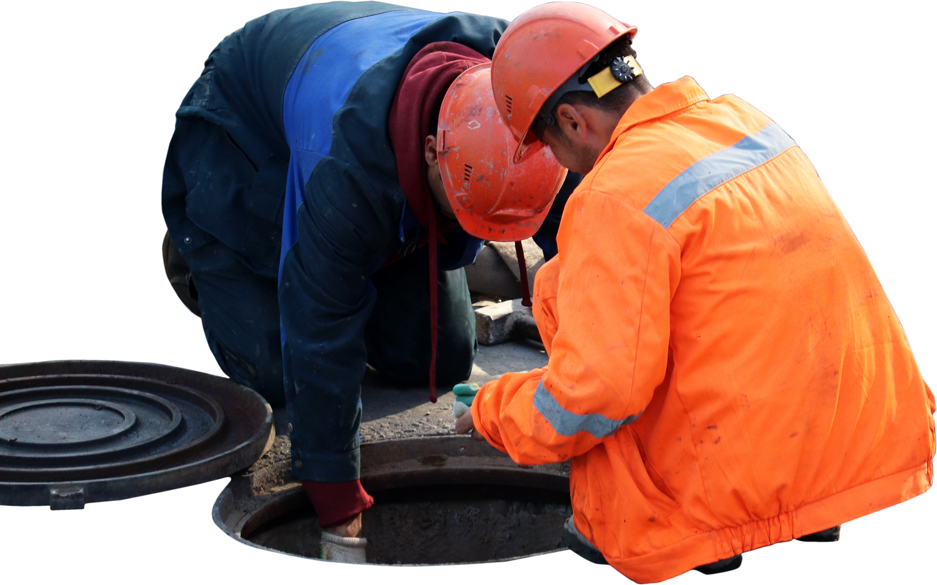 Two workers in orange and blue workwear inspecting an open manhole.