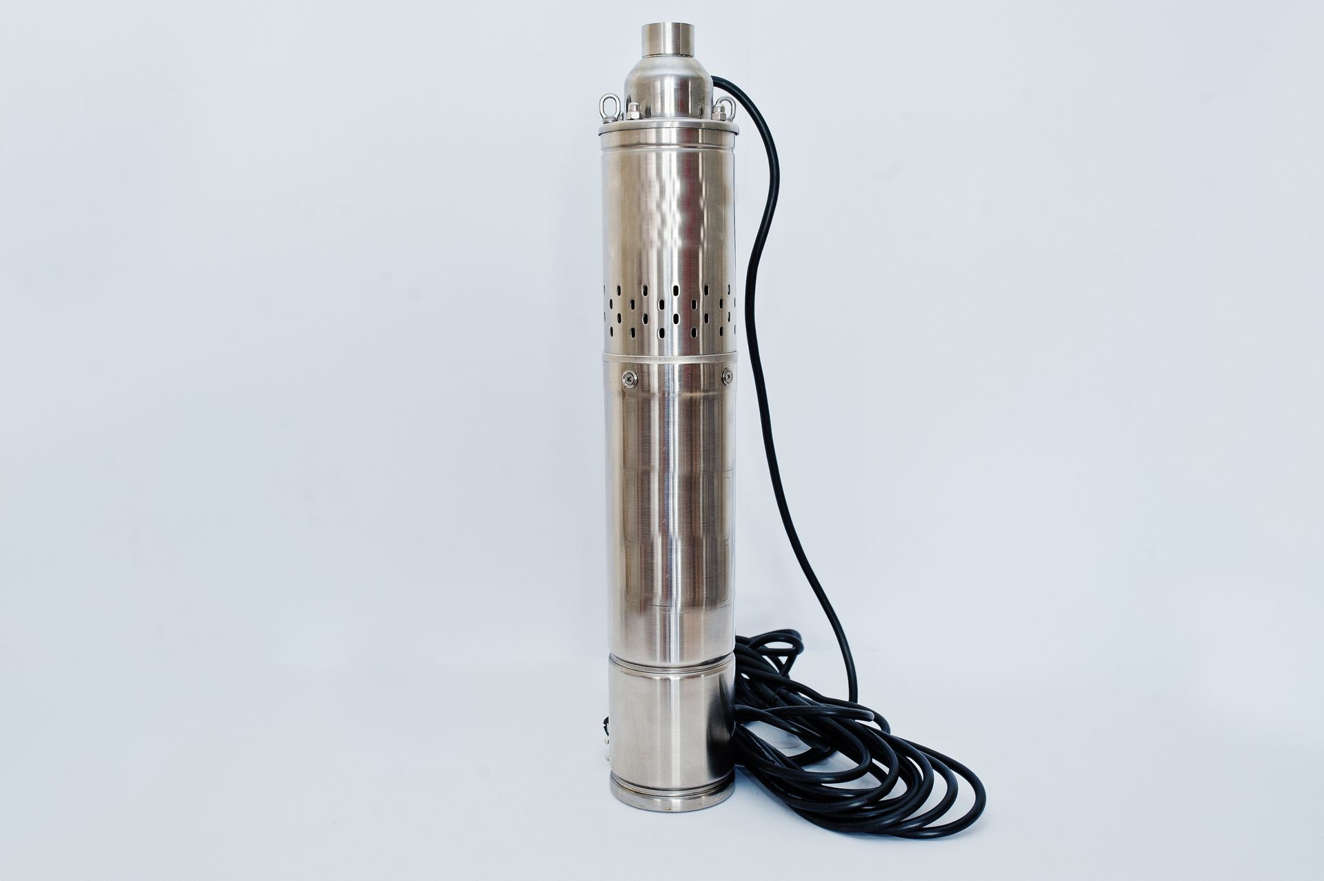 : A submersible well pump isolated on a white background.