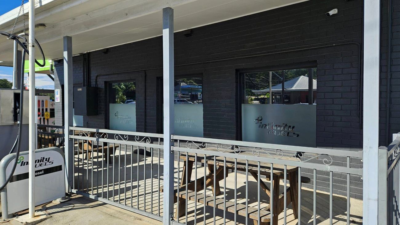 A Commercial Store With a Tinted Window — PJ Tinting In Laurieton, NSW
